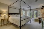Master Bedroom, features Kings Size bed, seating area with gorgeous Mountain Views , TV